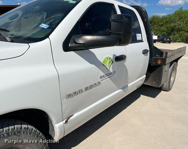 image for item DQ2215 2005 Dodge Ram 3500  Quad Cab flatbed pickup truck