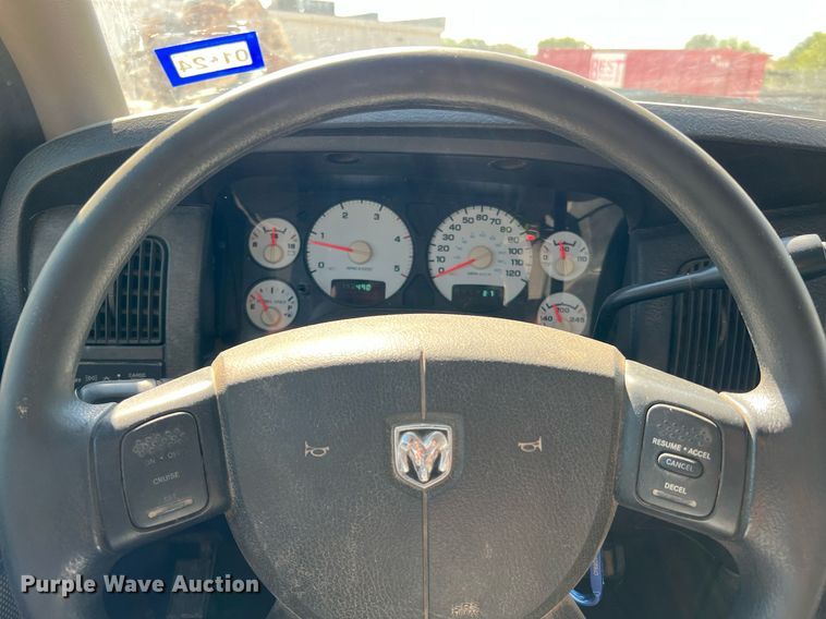 image for item DQ2215 2005 Dodge Ram 3500  Quad Cab flatbed pickup truck