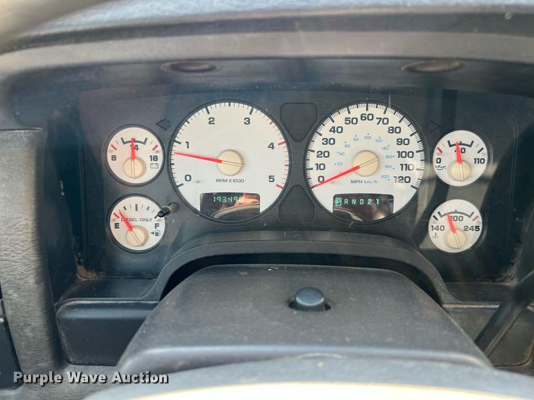 image for item DQ2215 2005 Dodge Ram 3500  Quad Cab flatbed pickup truck