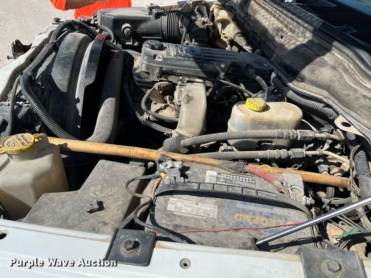 image for item DQ2215 2005 Dodge Ram 3500  Quad Cab flatbed pickup truck