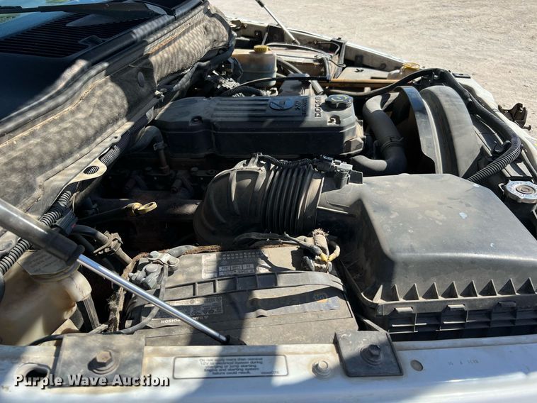 image for item DQ2215 2005 Dodge Ram 3500  Quad Cab flatbed pickup truck