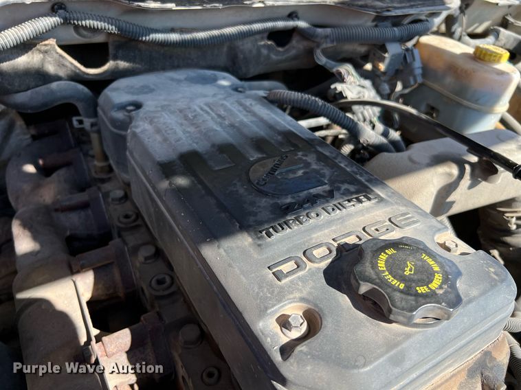 image for item DQ2215 2005 Dodge Ram 3500  Quad Cab flatbed pickup truck