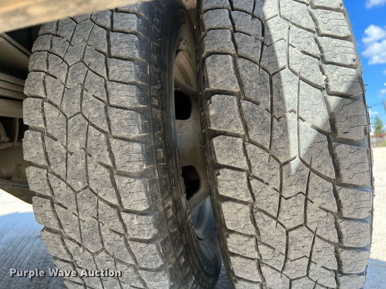 image for item DQ2215 2005 Dodge Ram 3500  Quad Cab flatbed pickup truck