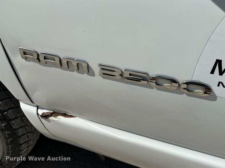 image for item DQ2215 2005 Dodge Ram 3500  Quad Cab flatbed pickup truck