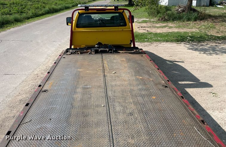 image for item HN9946 2011 Ford F650 Super Duty XLT Pro Loader  SuperCrew rollback truck