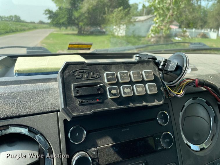 image for item HN9946 2011 Ford F650 Super Duty XLT Pro Loader  SuperCrew rollback truck