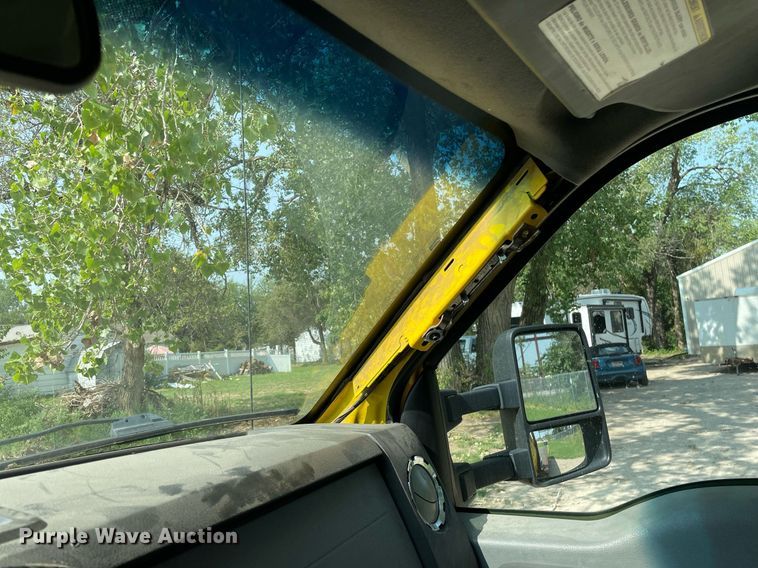 image for item HN9946 2011 Ford F650 Super Duty XLT Pro Loader  SuperCrew rollback truck