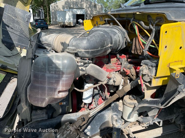 image for item HN9946 2011 Ford F650 Super Duty XLT Pro Loader  SuperCrew rollback truck