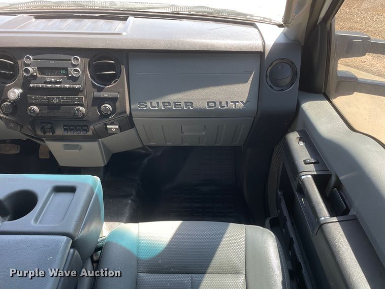 image for item KM9812 2015 Ford F350 Super Duty  Crew Cab flatbed pickup truck