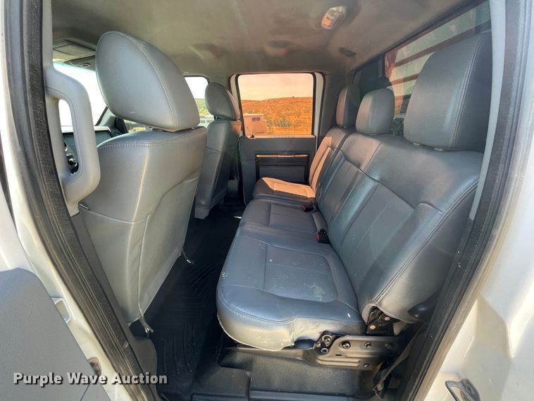 image for item KM9812 2015 Ford F350 Super Duty  Crew Cab flatbed pickup truck