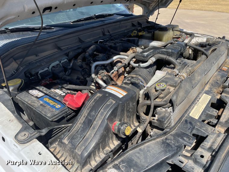 image for item KM9812 2015 Ford F350 Super Duty  Crew Cab flatbed pickup truck