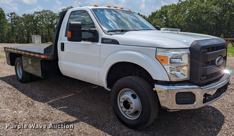 image for item LM9789 2015 Ford F350 Super Duty  flatbed pickup truck