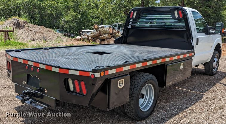 image for item LM9789 2015 Ford F350 Super Duty  flatbed pickup truck