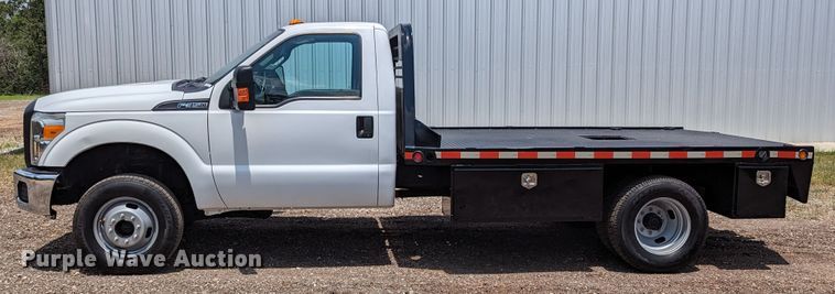 image for item LM9789 2015 Ford F350 Super Duty  flatbed pickup truck