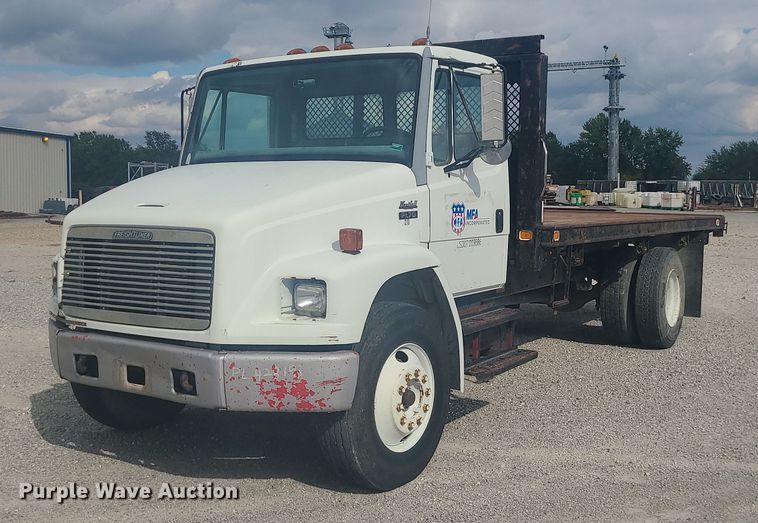 image for item MJ9387 1993 Freightliner FL70  dump flatbed truck