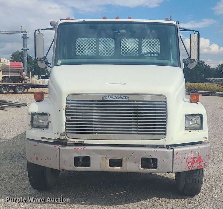 image for item MJ9387 1993 Freightliner FL70  dump flatbed truck