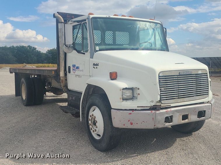 image for item MJ9387 1993 Freightliner FL70  dump flatbed truck