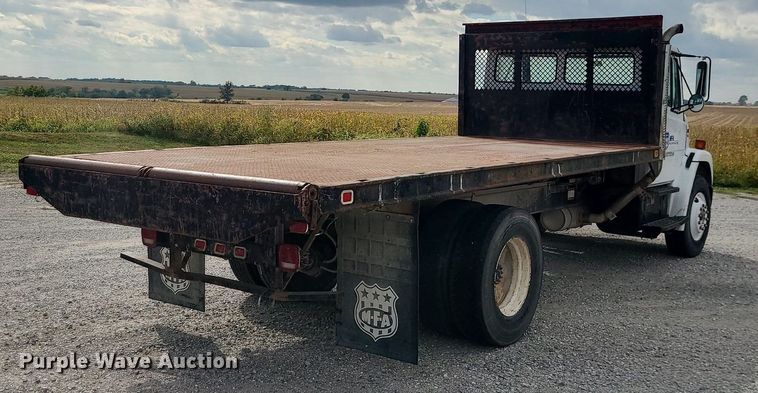 image for item MJ9387 1993 Freightliner FL70  dump flatbed truck