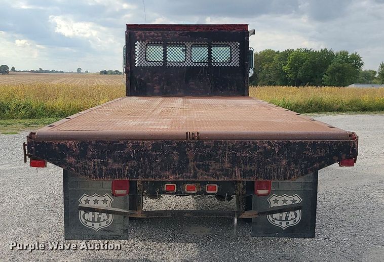 image for item MJ9387 1993 Freightliner FL70  dump flatbed truck