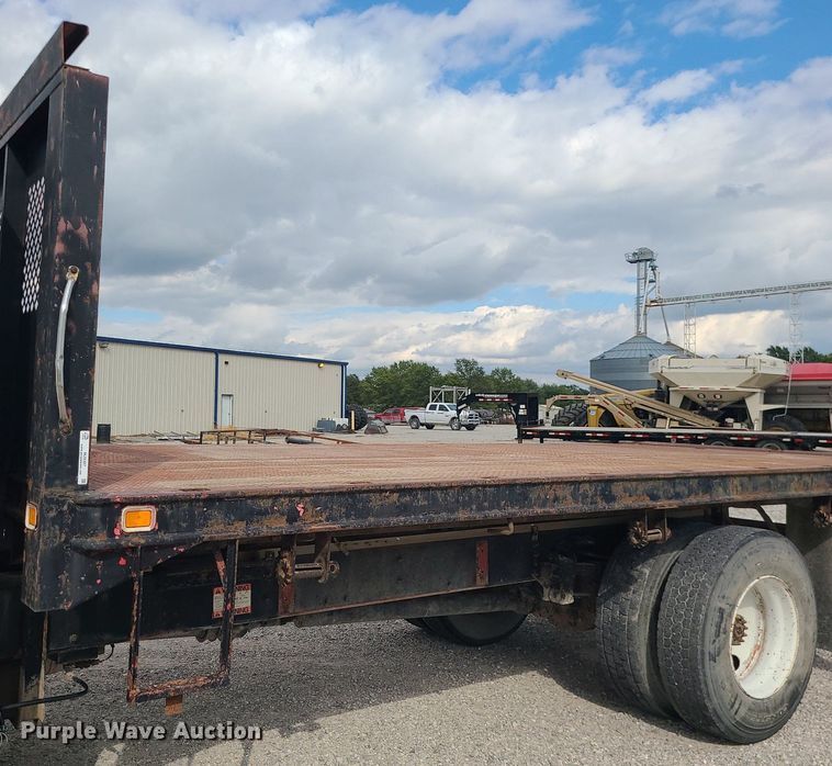 image for item MJ9387 1993 Freightliner FL70  dump flatbed truck