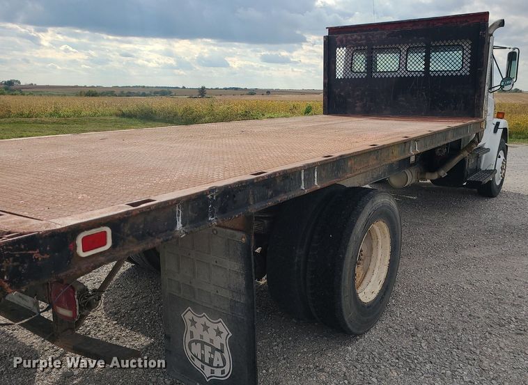 image for item MJ9387 1993 Freightliner FL70  dump flatbed truck