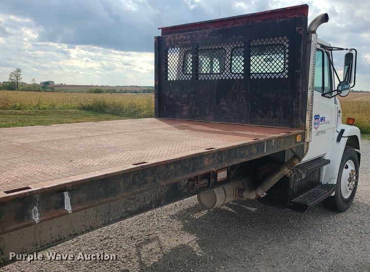 image for item MJ9387 1993 Freightliner FL70  dump flatbed truck