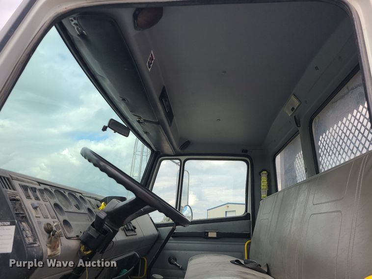 image for item MJ9387 1993 Freightliner FL70  dump flatbed truck