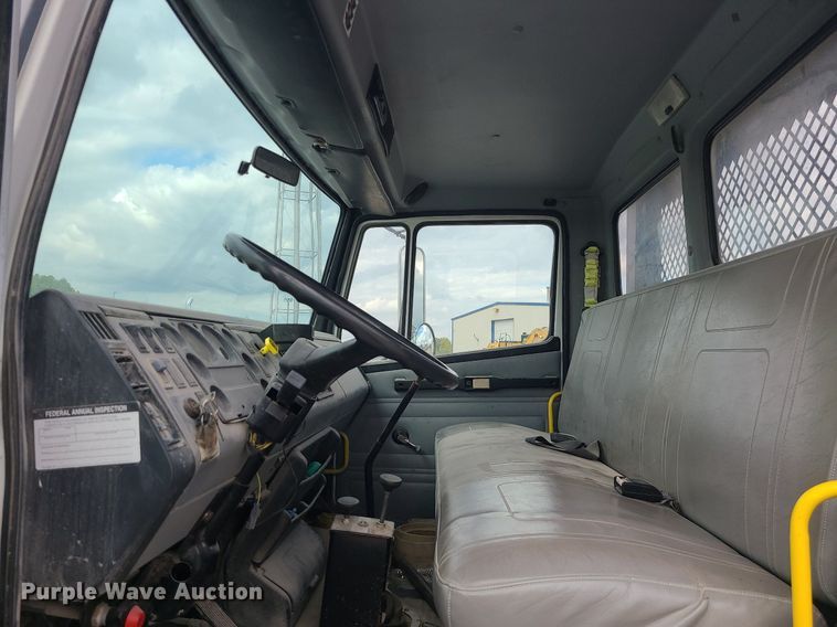 image for item MJ9387 1993 Freightliner FL70  dump flatbed truck