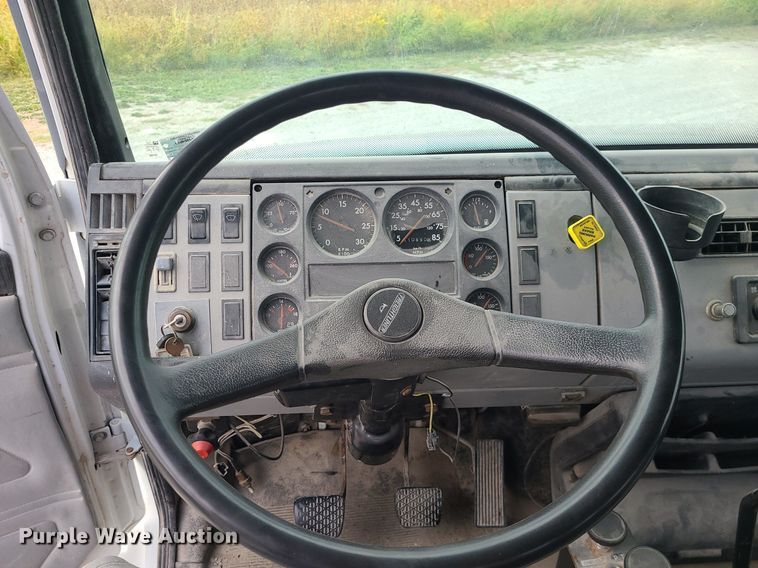 image for item MJ9387 1993 Freightliner FL70  dump flatbed truck