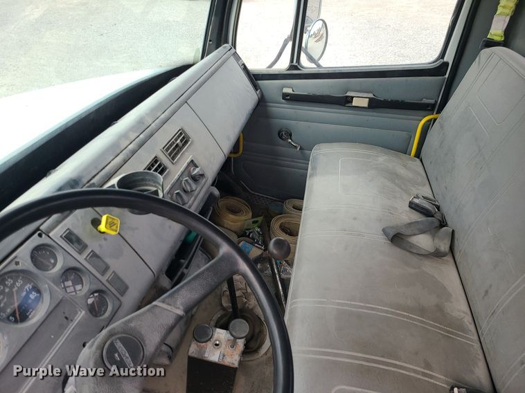 image for item MJ9387 1993 Freightliner FL70  dump flatbed truck