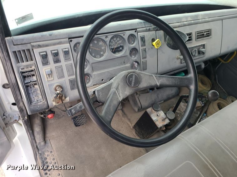 image for item MJ9387 1993 Freightliner FL70  dump flatbed truck