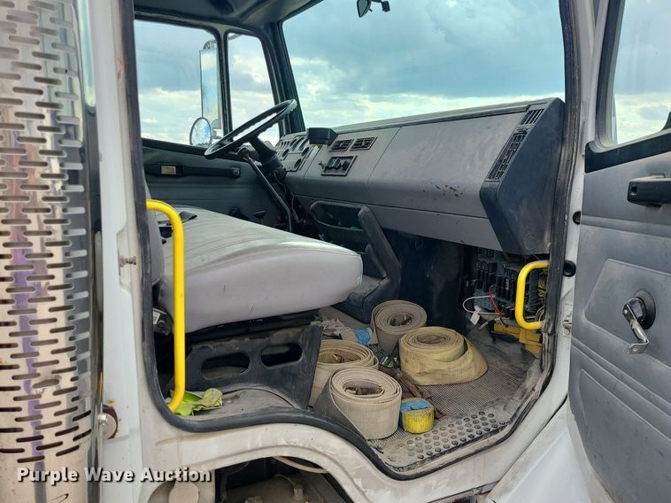 image for item MJ9387 1993 Freightliner FL70  dump flatbed truck