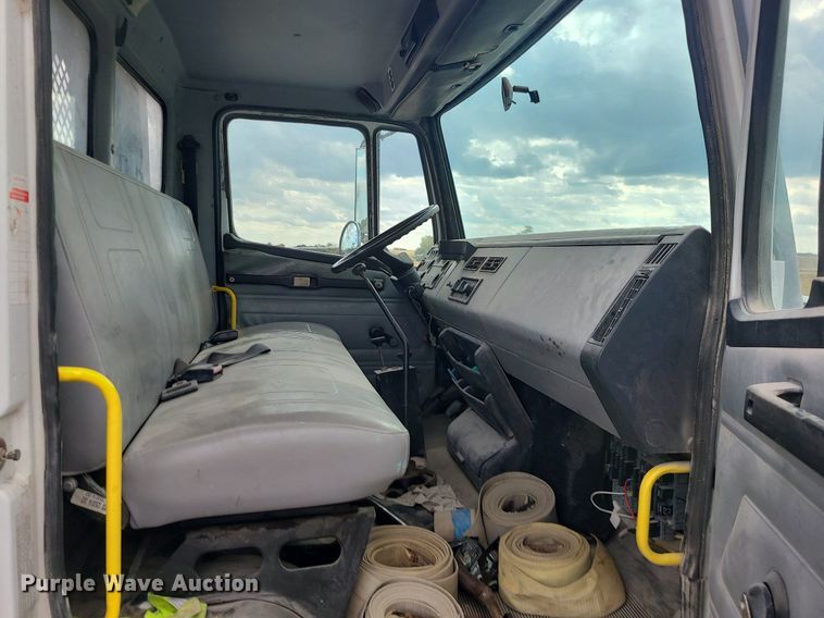 image for item MJ9387 1993 Freightliner FL70  dump flatbed truck