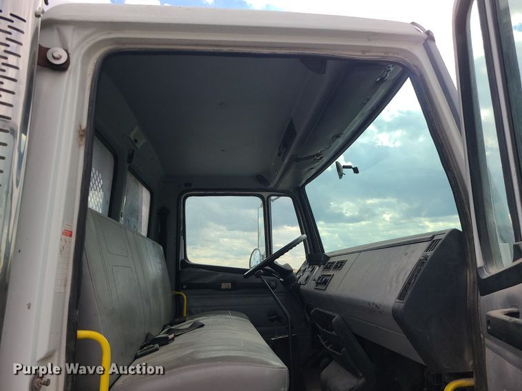 image for item MJ9387 1993 Freightliner FL70  dump flatbed truck