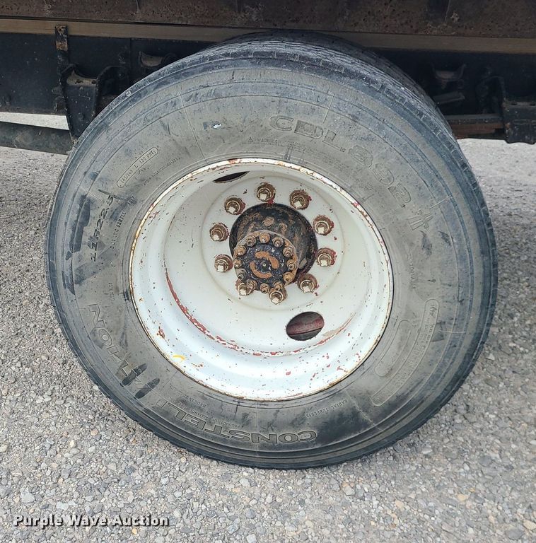 image for item MJ9387 1993 Freightliner FL70  dump flatbed truck