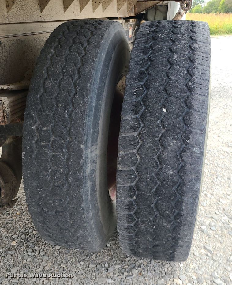 image for item MJ9387 1993 Freightliner FL70  dump flatbed truck