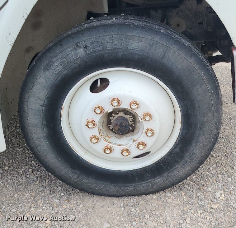 image for item MJ9387 1993 Freightliner FL70  dump flatbed truck