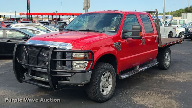 image for item MJ9410 2010 Ford F250 Super Duty  Crew Cab flatbed pickup truck