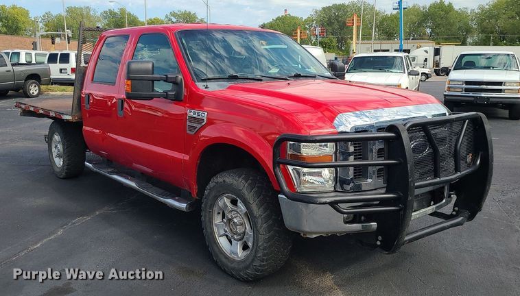 image for item MJ9410 2010 Ford F250 Super Duty  Crew Cab flatbed pickup truck