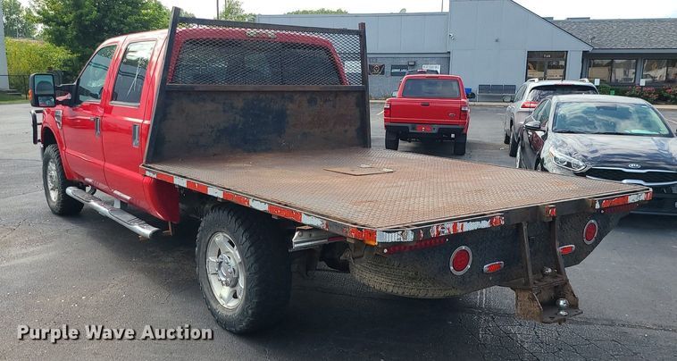 image for item MJ9410 2010 Ford F250 Super Duty  Crew Cab flatbed pickup truck