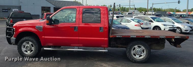 image for item MJ9410 2010 Ford F250 Super Duty  Crew Cab flatbed pickup truck