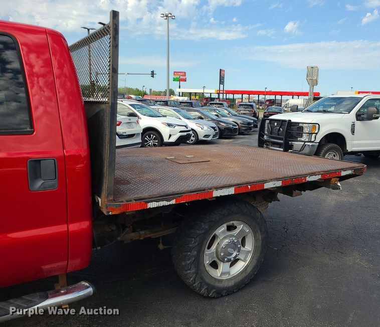 image for item MJ9410 2010 Ford F250 Super Duty  Crew Cab flatbed pickup truck