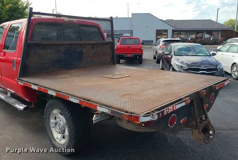 image for item MJ9410 2010 Ford F250 Super Duty  Crew Cab flatbed pickup truck