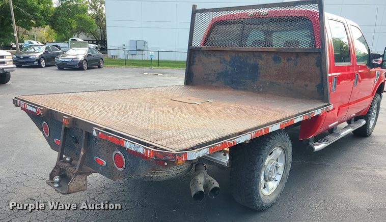 image for item MJ9410 2010 Ford F250 Super Duty  Crew Cab flatbed pickup truck