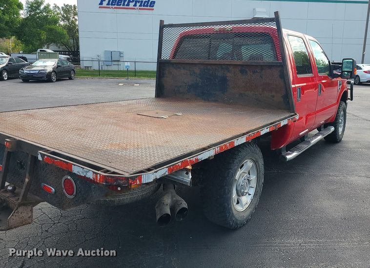 image for item MJ9410 2010 Ford F250 Super Duty  Crew Cab flatbed pickup truck