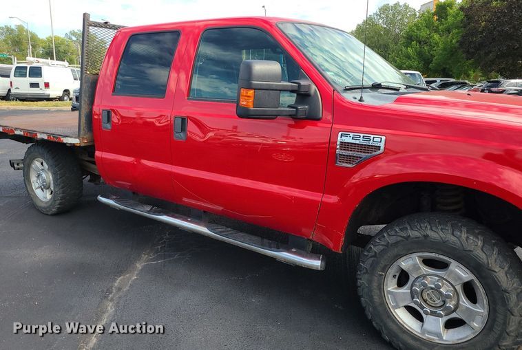 image for item MJ9410 2010 Ford F250 Super Duty  Crew Cab flatbed pickup truck