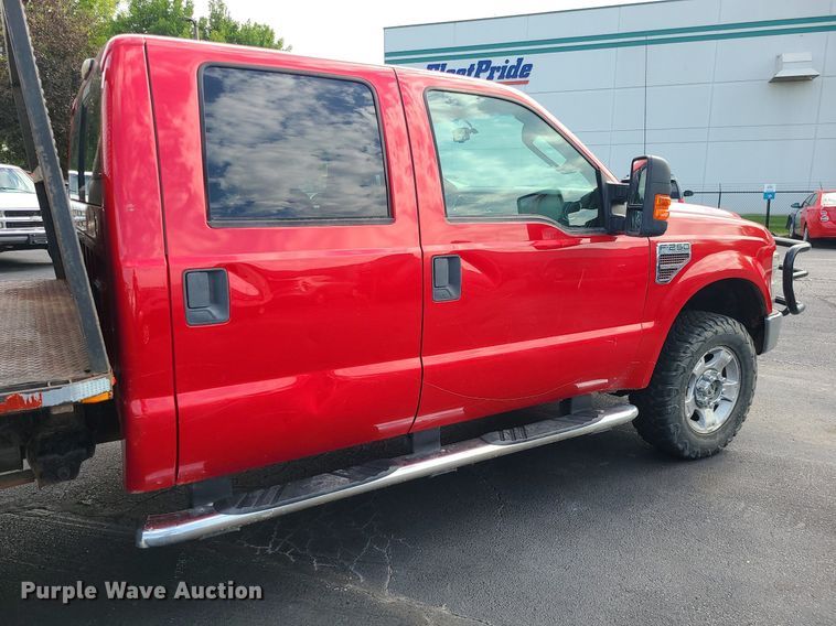 image for item MJ9410 2010 Ford F250 Super Duty  Crew Cab flatbed pickup truck