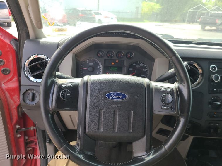 image for item MJ9410 2010 Ford F250 Super Duty  Crew Cab flatbed pickup truck