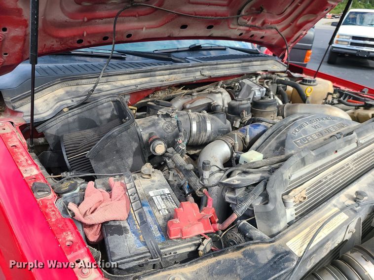 image for item MJ9410 2010 Ford F250 Super Duty  Crew Cab flatbed pickup truck