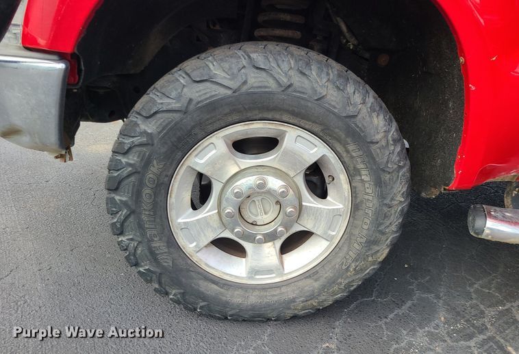 image for item MJ9410 2010 Ford F250 Super Duty  Crew Cab flatbed pickup truck